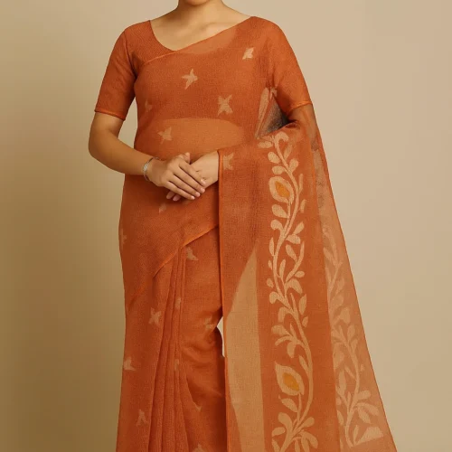 Rajeswari Boutiques – Floral Print Handloom Muslin Saree in Rust-Orange with Yellow Tassels