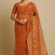 Rajeswari Boutiques – Floral Print Handloom Muslin Saree in Rust-Orange with Yellow Tassels